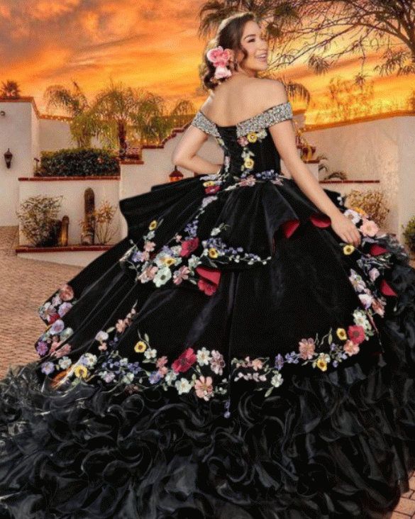 THIS DRESS IS  MADE  TO  ORDER Enjoy a perfect fit in your own custom made to measure dress. --------------------------------------------------- Celebrate your  Quinces with elegance and style! Introducing our dazzling black quinceanera dress with floral embroidery, a unique and exquisite creation that will make you feel like a true princess on your big day.  This stunning dress has been designed with meticulous attention to detail, combining the sophistication of black  velvet and organza, with the delicacy of beautiful floral embroidery. The fitted bodice flatters your figure,  it has a lace-up, corset back, that allows easy adjustability, thus highlighting your curves, while the off-shoulder neckline adds a touch of elegance and subtlety. Delicate floral embroidery  in deep and light pa Vaquera Quinceanera Dress, Black Charro Quince Dress, Gothic Quinceanera, Black Quince Dress, Black Quinceanera Dress, Mariachi Costume, Folklorico Dresses, Quinceanera Dresses Mexican, Black Quinceanera