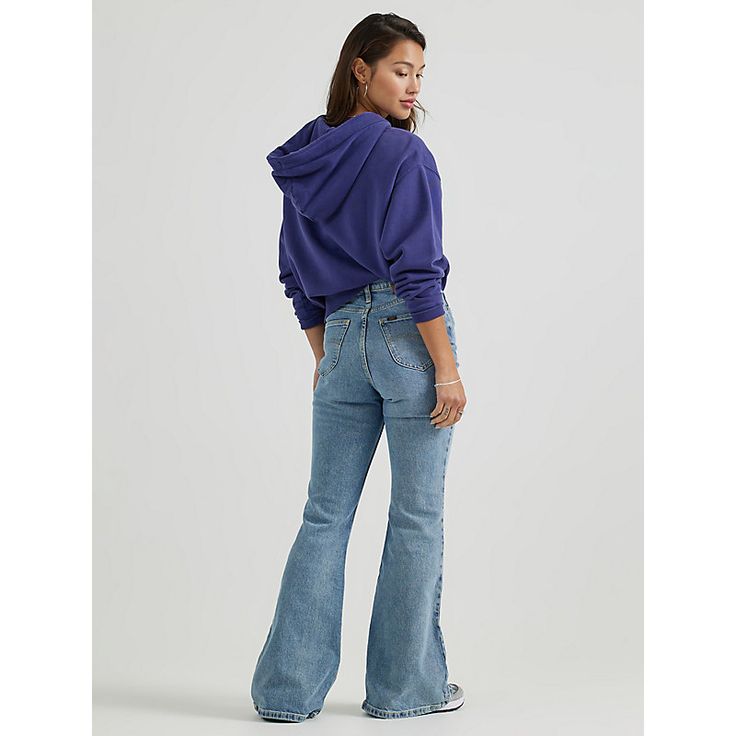 "(Previously known as Vintage Modern High Rise Seamed Flare Jean) With enough extra flare-legged fabric to dress an entire decade, our High Rise Flare Jean isn't just a '70s throwback; it's the real deal. Rekindled from patterns in our archives, this high rise creates a beautifully trimmed waistline, followed by a snug-yet-comfortable fit in the seat and thighs and a 31"" inseam length. With a wash inspired by a pair of archived bell bottoms, these look like they walked right outta Woodstock." 6 Retro Flares With Flared Hem, Retro Flares For Fall, Retro Fall Flares, 70s Inspired Flare Jeans For Fall, 70s Inspired Fall Flare Jeans, Retro Cotton Flares For Fall, Retro Spring Flares With Flared Hem, Retro Full-length Fall Flares, Retro Full Length Fall Flares