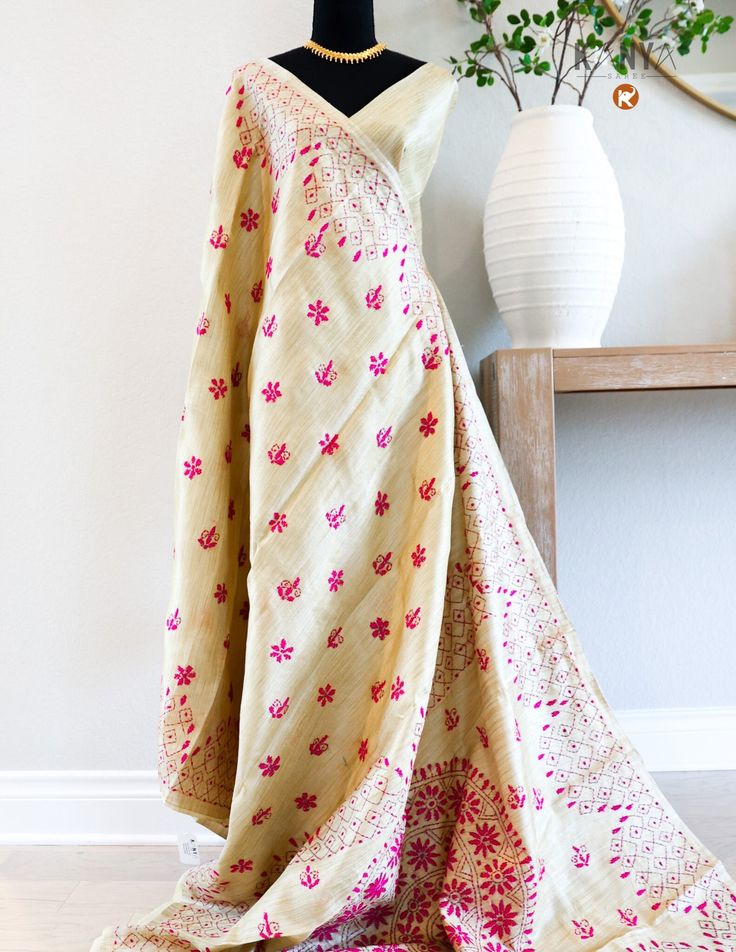 Discover our Semi Tussar Silk Kantha collection, where tradition meets modern elegance. Crafted with care, each piece features the luxurious feel of semi Tussar silk and is adorned with delicate hand-stitched Kantha embroidery. Add a touch of artisanal charm to your wardrobe or gift someone special with our timeless and unique pieces. Silk Salwar Kameez With Traditional Drape For Spring, Silk Traditional Drape Salwar Kameez For Spring, Cream Raw Silk Traditional Wear, Cream Traditional Raw Silk Wear, Traditional Cream Raw Silk Wear, Tissue Silk Salwar Kameez For Festive Spring Occasions, Festive Tissue Silk Salwar Kameez For Spring, Embroidered Salwar Kameez In Slub Silk With Traditional Drape, Cream Traditional Wear In Raw Silk With Cutdana