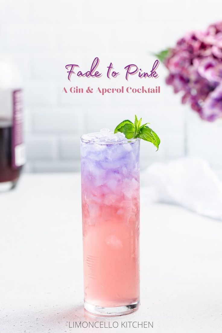 Highball cocktail on a countertop with pink and purple layers and a mint sprig cocktail. Pink Gin Cocktails, Empress Gin, Layered Drinks, Purple Drinks, Purple Cocktails, Gin Cocktail Recipes, Gin Drinks, Fancy Cocktails, Pink Gin