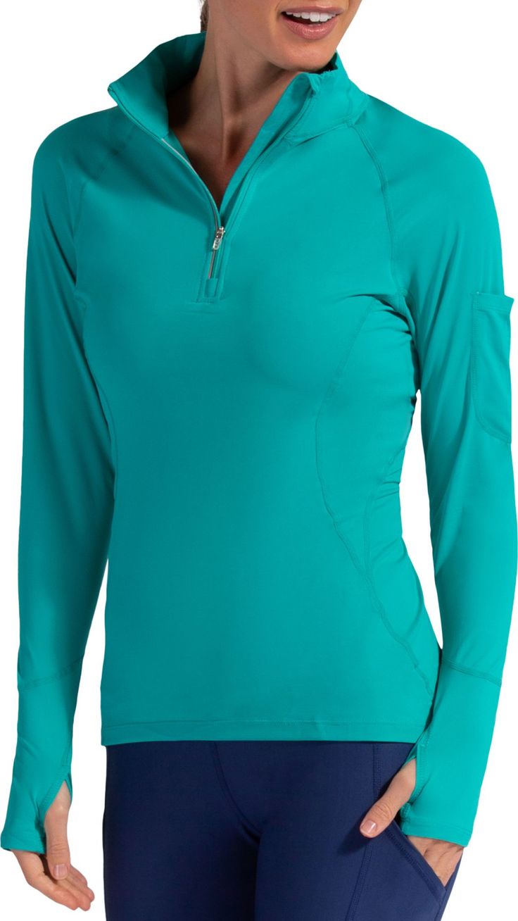 Fit & Design Slim fit pullover sun shirt for land and water Mock neck with 1/4 zip closure Elongated long sleeves offer hand protection Fabric is lightweight, soft, breathable, and shrink resistant 4-way stretch lets you move without restriction Flat seams Functional pocket on left sleeve Packable design BloqUV® logo on back right hip Technology BloqTek™ fabric has inherent UPF 50+ protection that doesn’t wash out; sunscreen needed only on exposed areas Moisture-wicking and quick-drying properti Long Sleeve Stretch Top With Upf 50+, Upf 50+ Stretch Long Sleeve Top, Long Sleeve Athleisure Tops With Upf 50+, Long Sleeve Workout Tops With Upf 50+, Upf 50+ Long Sleeve Workout Tops, Green Long Sleeve Tops With Upf 50+, Blue Fitted Half-zip Top, Blue Stretch Half-zip Top, Solid Color Moisture-wicking Half-zip Top