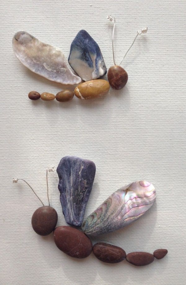 three different types of rocks and pebbles on a white surface