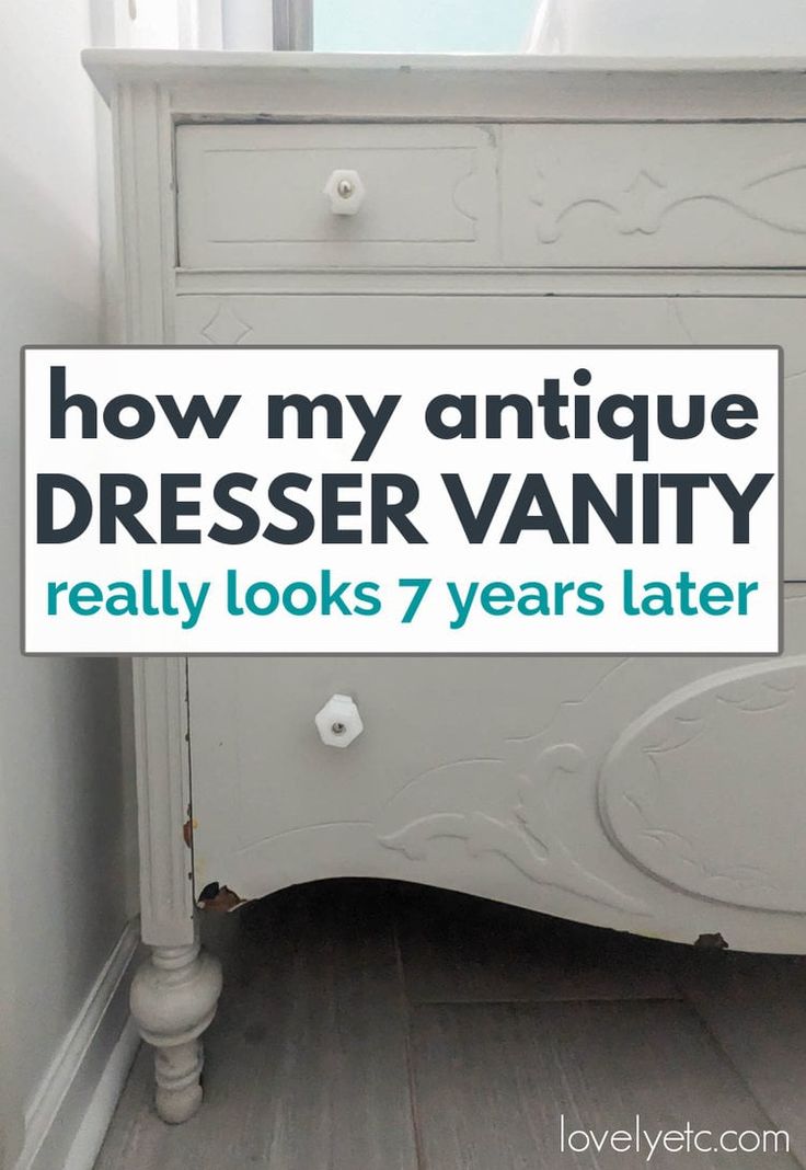 I'm spilling all the details about how my antique dresser bathroom vanity has really held up after seven years of use by my family of five. If you've ever considered turning a dresser into a bathroom vanity, read this first to see if it's really a good idea. Dresser Bathroom Vanity Vessel Sink, Diy Dresser To Vanity, Making A Dresser Into A Bathroom Vanity, White Dresser In Bathroom, Bathroom With Dresser Vanity, Vintage Dresser Sink, Buffet To Vanity Bathroom, Diy Dresser Vanity Bathroom, Furniture Turned Into Bathroom Vanity