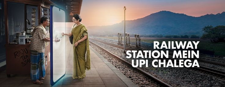 two women are standing at the train station and one is holding her hand out to another woman