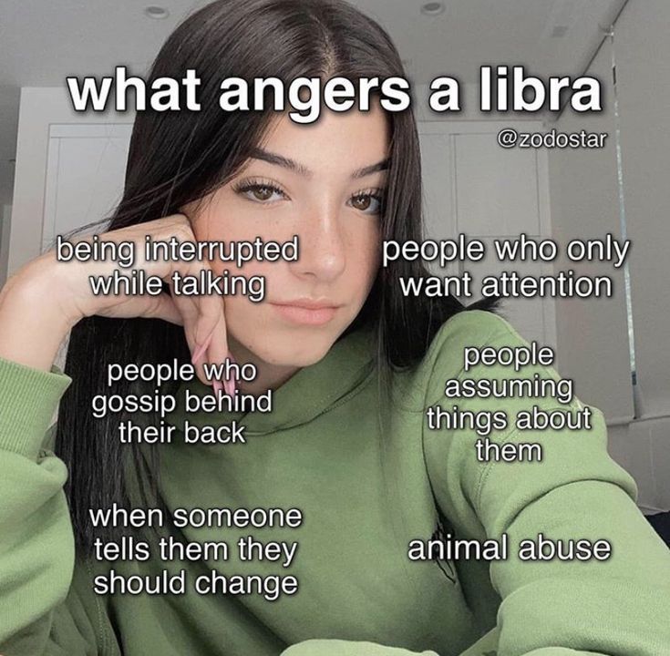 a woman sitting at a table with her hand on her chin and the words what angerers a libra above her head