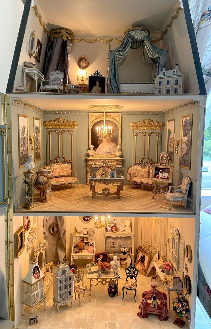 a doll house with furniture and accessories in it