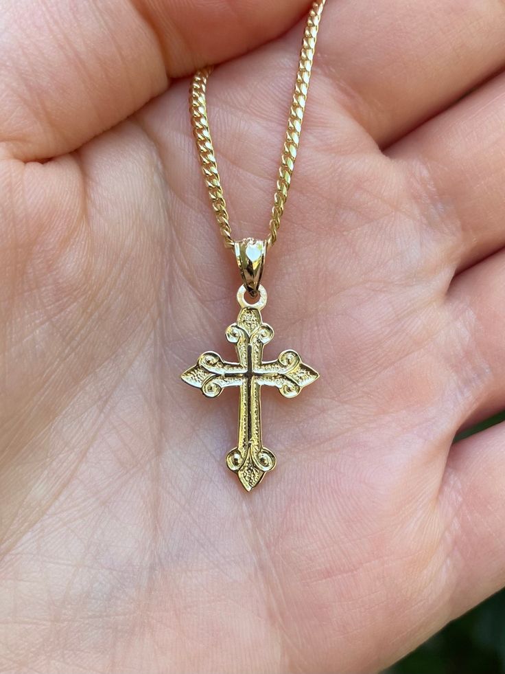 Beautiful 14k yellow gold  cross pendant.  Material: 14k solid yellow gold. Length: Approximately 1 inch long. Width: Approximately .25" wide. Weight: Approximately 1.3 grams.  Comes in a nice box. *Chain is sold separately. Chain typically weighs 5-7 grams depending on length chosen. It is a 14k gold Miami Cuban 2mm. Spiritual 14k Gold Cross Jewelry, Yellow Gold Cross Necklaces For Baptism, 14k Gold Cross Necklace For First Communion, Gold Spiritual Cross Necklace In 14k, Yellow Gold Cross Pendant For First Communion, Yellow Gold Cross Pendant For Baptism, Gold Crucifix Jewelry Stamped 14k, Gold Cross Jewelry In 14k Gold, Yellow Gold Baptism Cross Pendant Jewelry