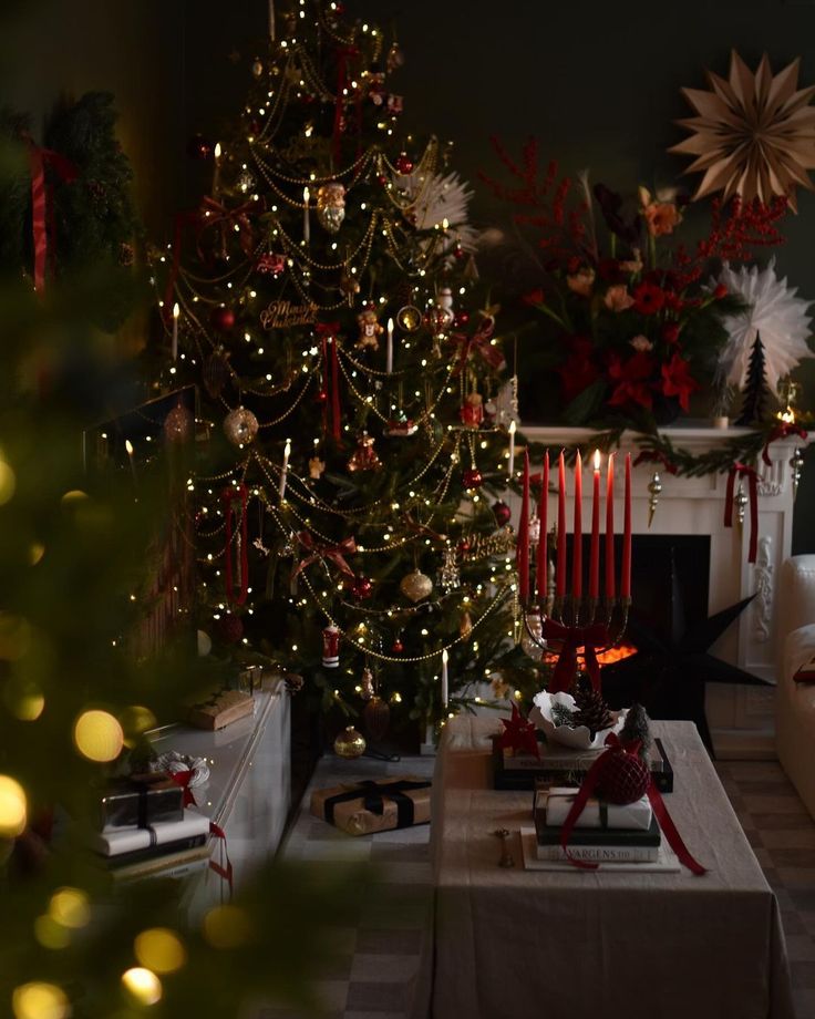 a living room decorated for christmas with a lit tree in the corner and presents on the coffee table