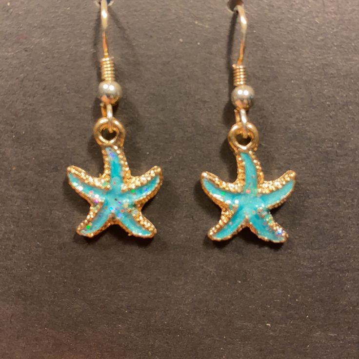 New Handmade Starfish Earrings. Adjustable Blue Jewelry With Starfish Charm, Adjustable Blue Starfish Jewelry, Coconut Girl Earrings, Nickel-free Starfish Earrings Ocean-inspired, Handmade Ocean-inspired Star Earrings, Blue Star Charm Drop Earrings, Blue Star Charm Earrings As Gift, Blue Star Charm Earrings For Gift, Blue Star Charm Jewelry