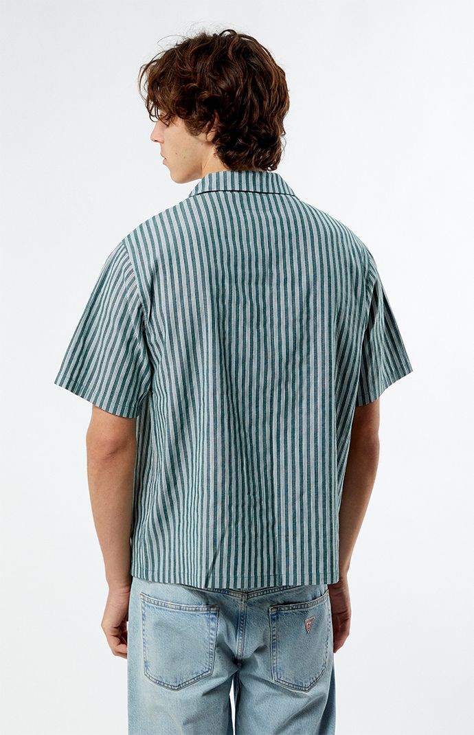 The Embroidered Stripe Camp Shirt from PacSun elevates your everyday style with its trendy design and comfortable cotton blend. Featuring a collared neckline, button closures, stripes, and an embroidered logo on the left chest, this regular fit shirt is a versatile addition to any wardrobe.


	Collared neckline
	Short sleeves
	Standard fit
	Button closures
	Left chest embroidery
	80% Cotton, 20% polyester
	Machine washable
	Model is wearings size medium
	Model Measurements: 6’1”  Height, 30” Waist, 35” Hips Mens Striped Tshirt, Summer Stripes Outfit, Striped Tshirt Men, Stripes Outfit, Striped Tshirt, Stripe Outfits, Mens Stripes, Summer Stripes, Camp Shirt