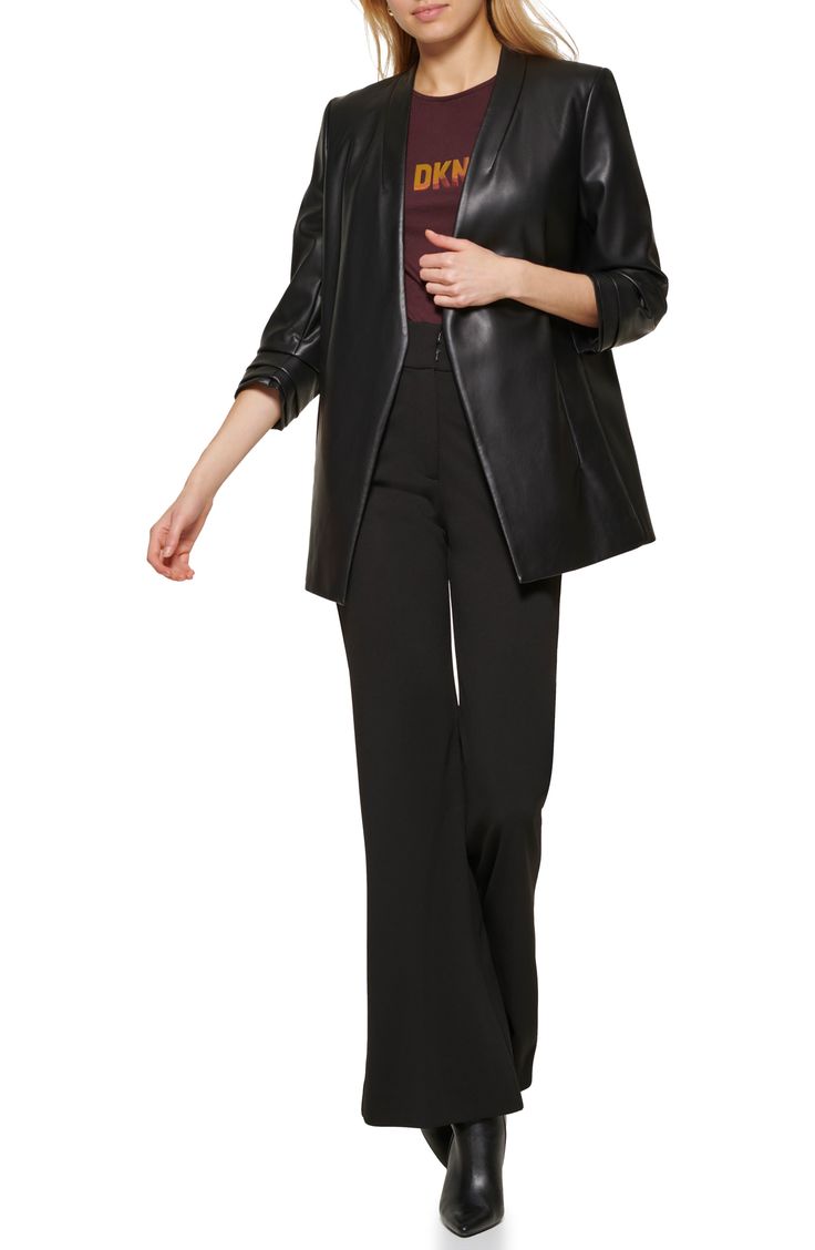 Supersleek faux leather with a semiglossy finish defines the look of this polished blazer softened by a shawl collar. Shawl collar Three-quarter sleeves 100% polyurethane Machine wash, tumble dry Imported Faux Leather Blazer, Ruched Sleeve, Leather Blazer, Shawl Collar, Three Quarter Sleeves, Three Quarter, Duster Coat, Shawl, Faux Leather