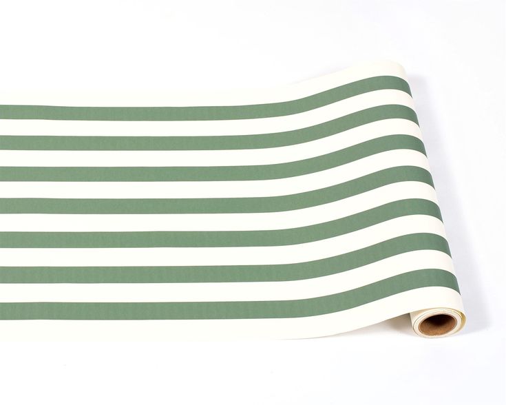 a roll of green and white striped paper