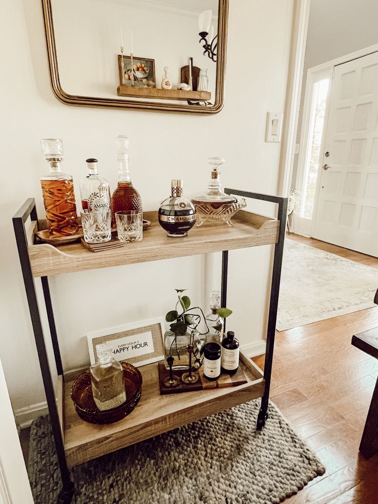 a shelf with liquor bottles on top of it