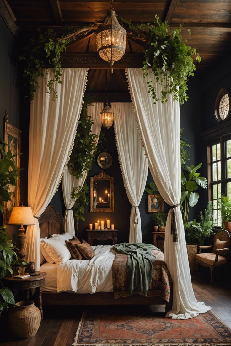 a bed with white drapes and plants hanging from the ceiling