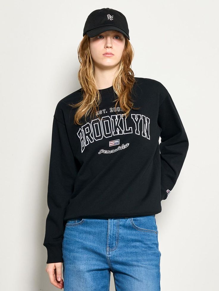 This is a comfortable and casual crewneck sweatshirt that is made out of sturdy cotton and polyester blend fabric. With a minimal yet unique design of graphic print on the front chest and logo emblem embroidered on the left cuff, it gives a casual and trendy look. - Ribbed neckline, cuff, and hem- Graphic print on the front chest- Logo emblem embroidery on the sleeve- Relaxed silhouette Basic Streetwear T-shirt With Ribbed Cuffs, Basic T-shirt With Ribbed Cuffs For Streetwear, Black Crew Neck Sweater With Embroidered Logo, Trendy College Tops With Ribbed Cuffs, Trendy Tops With Ribbed Cuffs For College, Black Cotton Sweater With Embroidered Logo, Oversized T-shirt With Ribbed Cuffs For College, Varsity Black Sweatshirt With Embroidered Logo, Oversized Black Sweater With Embroidered Logo