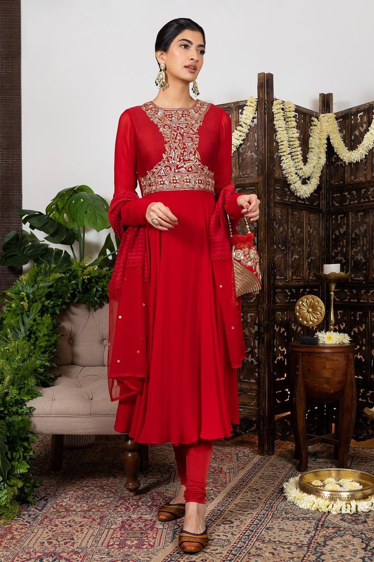 Red anarkali with embroidered bodice and gathered sleeves. Comes with satin striped dupatta and lycra churidar pant.
Component: 3
Embroidered
Neckline: Round
Sleeve Length: Full
Fabric: Anarkali: Chanderi, Georgette; Churidar Pant: Lycra; Dupatta: Georgette with satin stripes
Color: Red
Gathered sleeves
Aari and sequin work
Note: Bag shown in the image is not for sale - Aza Fashions Churidar Sleeves, Red Anarkali, Red Kurta, Designer Anarkali Suits, Embroidered Anarkali, Designer Anarkali, Embroidered Bodice, Gathered Sleeves, Embroidered Neckline