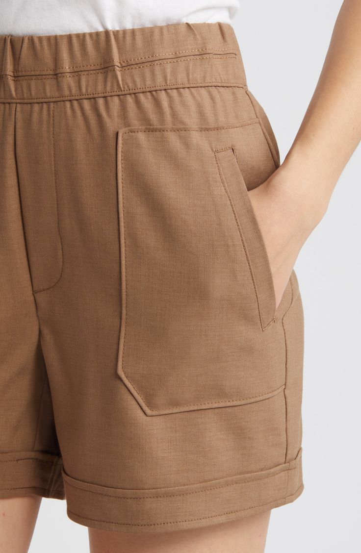 Deep pockets lend utilitarian style to these high-rise shorts that are a perfect addition to warm-weather ensembles. 5" inseam; 24" leg opening; 11" front rise; 16" back rise Elastic waist Front welt-patch pockets 48% polyester, 46% rayon, 4% spandex, 2% other fibers Machine wash, tumble dry Imported Utility Bermuda Bottoms With Built-in Shorts, Utility Bermuda Shorts With Built-in Shorts, Workwear Cargo Shorts With Patch Pockets, Cargo Shorts With Patch Pockets For Work, Everyday Brown Bottoms With Pockets, Spring Workwear Cargo Shorts With Side Pockets, Workwear Shorts With Cargo Pockets, Spring Cargo Shorts For Workwear With Side Pockets, Utility Cargo Shorts With Patch Pockets For Workwear