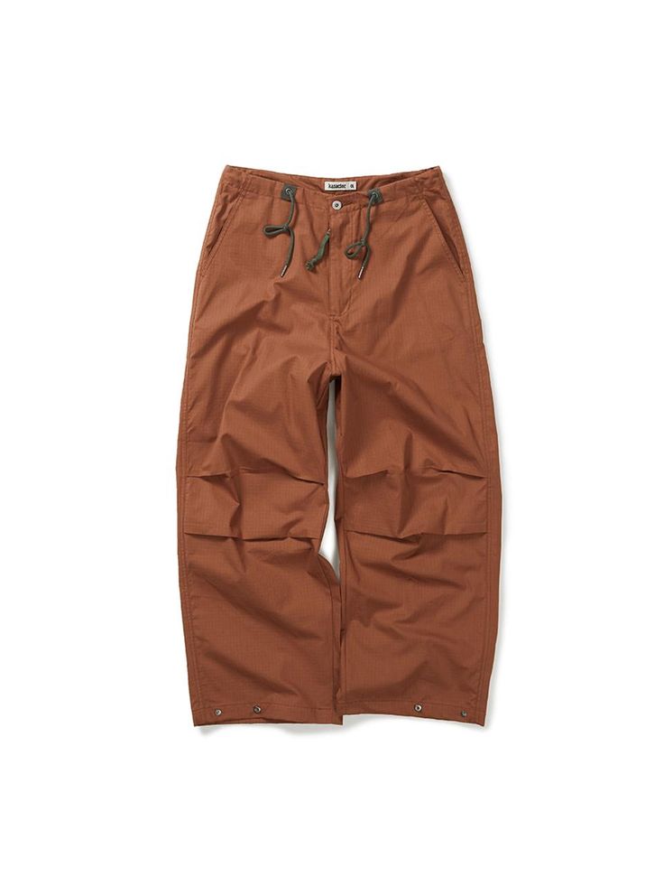 This is a trendy and comfortable pants by karactor that is made out of high quality and sturdy material. With distinctive mood of the design and comfortable wear, you can style it for your casual daily outfit.- Light texture of cotton fabric- Relaxed silhouette- Adjustable string on the waist- Trendy and comfortable casual mood Baggy Cotton Parachute Pants For Outdoor, Wide Leg Cotton Bottoms For Outdoor, Cotton Straight Leg Parachute Pants For Outdoor, Straight Leg Cotton Parachute Pants For Outdoor, Utility Cotton Parachute Pants In Straight Cut, Utility Cotton Parachute Pants, Brown Cotton Parachute Pants For Fall, Spring Cotton Parachute Pants For Outdoor, Fall Brown Cotton Parachute Pants