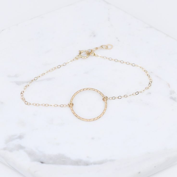 "14K karma gold bracelet - Solid Gold Bracelet, 14k delicate bracelet ★ Circle charm is 14k solid gold, it is about 17mm ★ The chain and all components are 14K solid yellow gold It comes with a 1/2\" extension chain. (If you order a 6\" bracelet, it will be a 6\" bracelet plus 1/2\" extension.) Please read our policies before you place your order. https://www.etsy.com/shop/SashJewelry/policy?ref=shopinfo_policies_leftnav To see other Mother daughter necklace set click here: https://www.etsy.com/ Minimalist Round Hammered Bracelet, Sterling Silver Gold Hammered Bracelets, Hammered Sterling Silver Bracelet In Gold Color, Gold Hammered Sterling Silver Bracelet, Minimalist Recycled Gold Round Bracelets, Minimalist Recycled Gold Bracelets, Dainty Yellow Gold Circular Jewelry, Dainty Circle Yellow Gold Jewelry, Simple 14k Yellow Gold Filled Bracelet