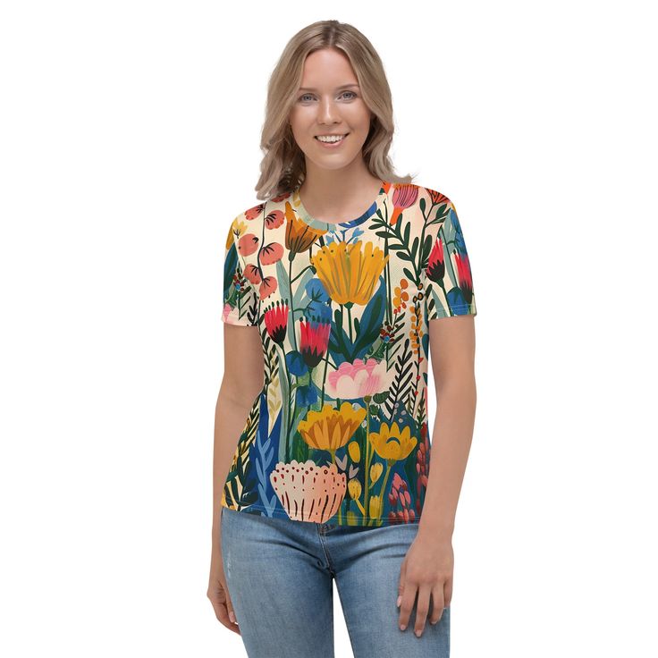 Get to know your new favorite tee—it's super smooth, super comfortable, and made from a cotton touch polyester jersey that won't fade after washing, now offering FREE SHIPPING to the US, Canada, EU, and UK! The artwork This captivating artwork features a lush array of Scandinavian flowers, painted in a vibrant and expressive style. The composition bursts with a variety of blooms in shades of pink, red, yellow, and blue, set against a light, airy background that enhances the vividness of each flo Printed Relaxed Fit Short Sleeve T-shirt, Yellow Cotton T-shirt With All Over Print, Comfortable Short Sleeve Graphic Print Tops, Yellow All Over Print Short Sleeve T-shirt, Multicolor Digital Print Short Sleeve Top, Yellow Short Sleeve T-shirt With All Over Print, Casual White Digital Print Top, White Digital Print Short Sleeve Tops, Relaxed Fit Graphic Tee With All Over Print