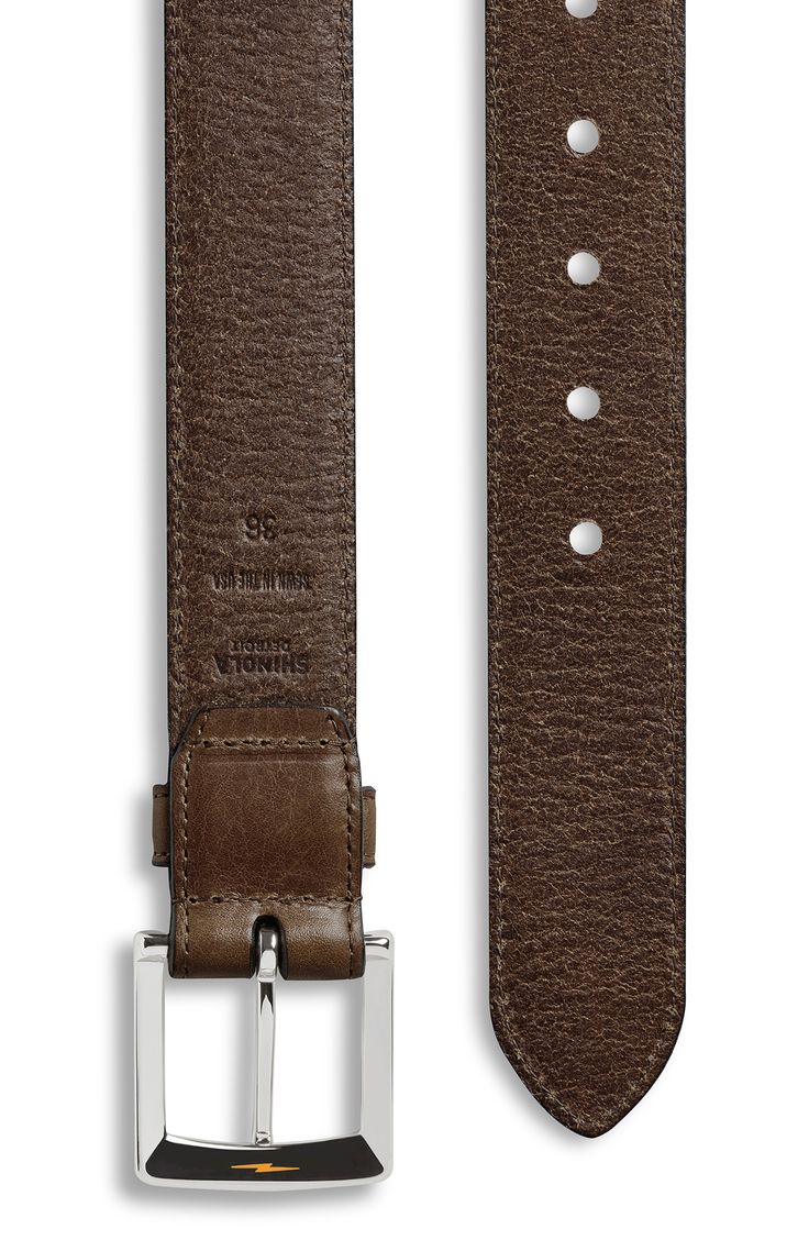 As life goes on, this all-time cow leather belt develops an aged patina with a polished plated brass buckle taking shine in front. Crafted in Shinola's Detroit leatherworks facility with skilled hands of precision ensures its lasting durability. Style Name:Shinola Bedrock Leather Belt. Style Number: 5812761. Available in stores. Classic Leather Belt Buckle With Antique Design, Classic Business Belt With Antique Buckle, Brown Leather Belt Buckle With Antique Style, Classic Leather Belt Buckles, Formal Leather Belt With Antique Buckle, Vintage Leather Belt For Business, Brown Leather Belt Buckle With Antique Design, Rectangular Leather Belt Buckle For Business, Classic Bridle Leather Belt With Leather Strap