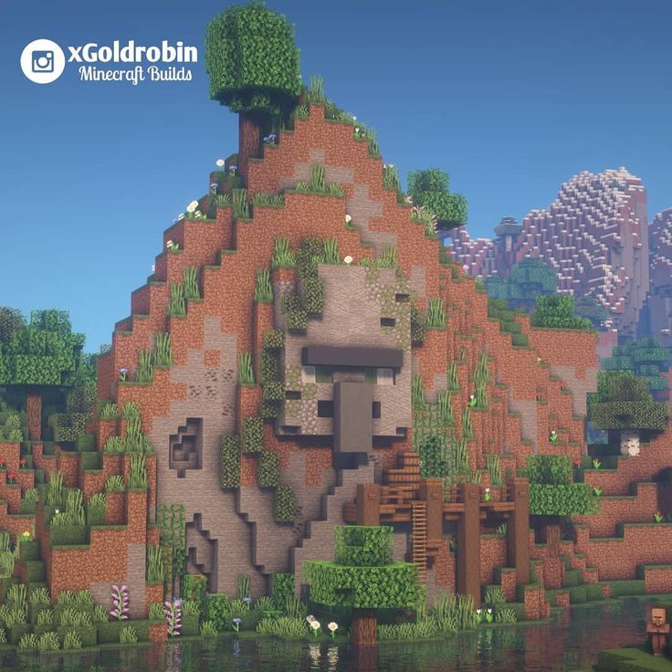 an image of a mountain with trees and bushes on it in the middle of a video game