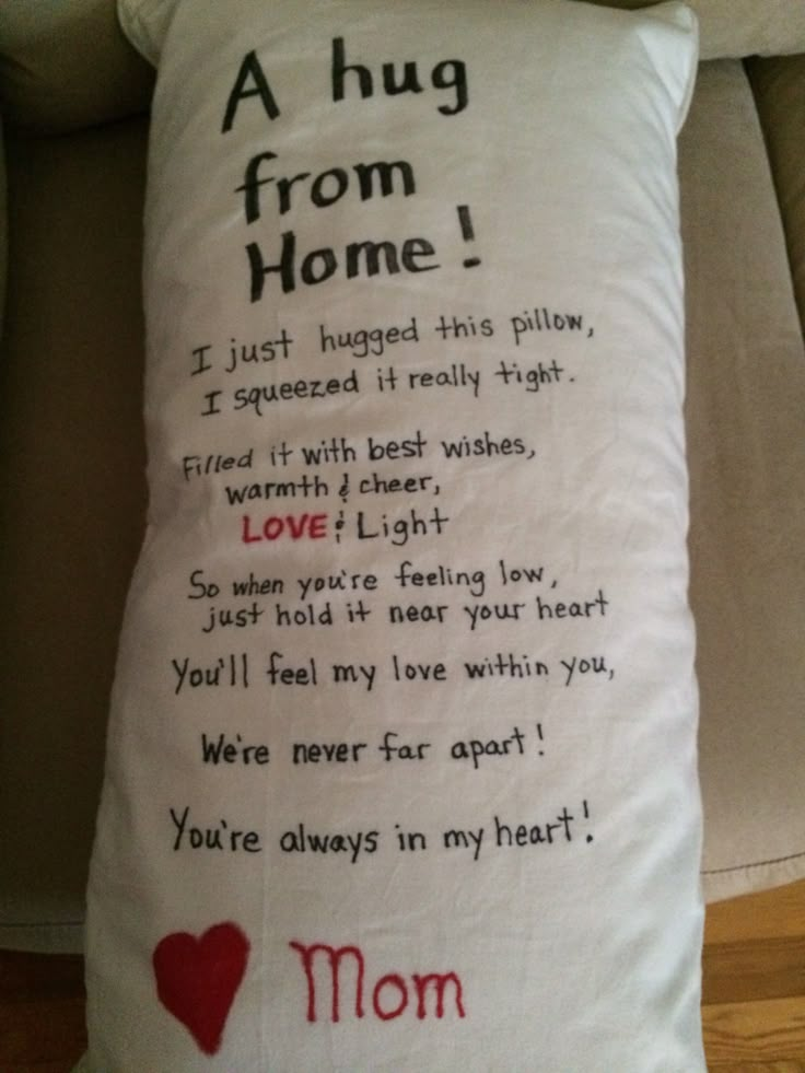 a pillow with a poem written on it that says,'a hug from home '