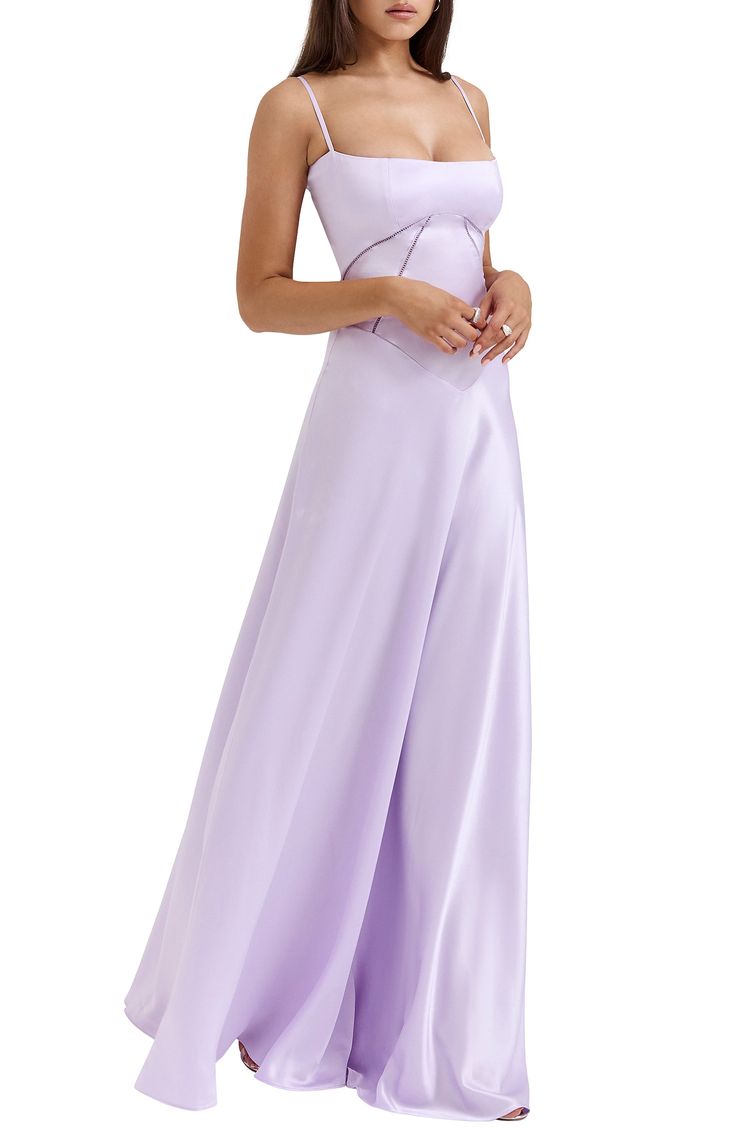 A sculpting corset-inspired bodice shapes this glamorous satin gown punctuated with a laced-up back. Exclusive retailer 52" length (size X-Large) Square neck Adjustable straps Unlined 75% acetate, 25% polyester with 80% polyamide 20% elastane contrast Dry clean Imported Lavender Dress Satin, Lilac Evening Dress, Sleeveless Satin Gown With Corset Back, Satin Dress With Lace-up Back And Sweetheart Neckline, Sleeveless Satin Gown With Boned Bodice, Sleeveless Satin Gown For Debutante Ball, Sleeveless Satin Corset Dress For Bridesmaids, Debutante Ball Evening Dress With Boned Bodice, Dusty Lilac Bridesmaid Dresses