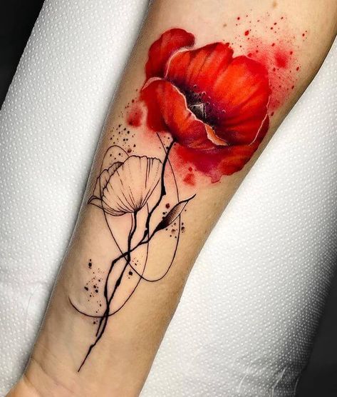 a woman's arm with a red flower tattoo on it