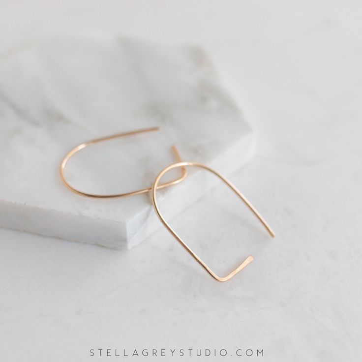 Ultra minimalist, easy to wear, and perfect for work or play! Material choices: solid 14k gold, 14k yellow gold filled, 14k rose gold filled, or sterling silver Size: approx. 1.25" x .75" Large archway earrings available here Gold Aesthetic Jewelry, Best Candle Scents, Ultra Minimalist, Ears Pierced, Arch Earrings, Earrings Minimal, Gold Bar Earrings, Tattoo Women, Minimal Earrings