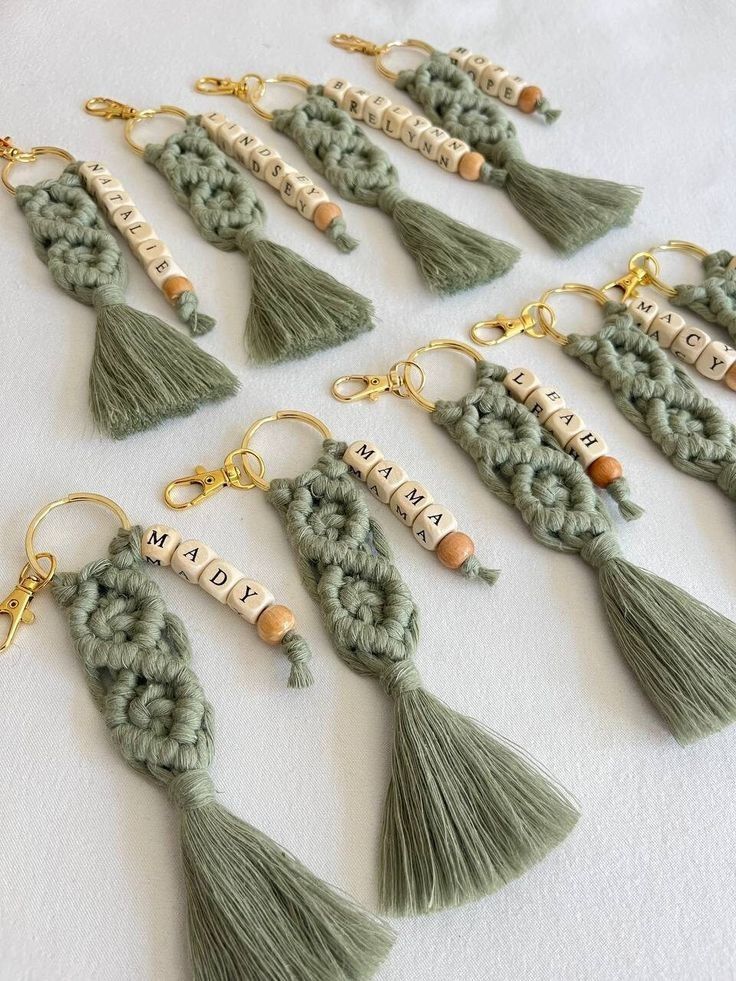 crochet tassel keychains with names and tassels on them