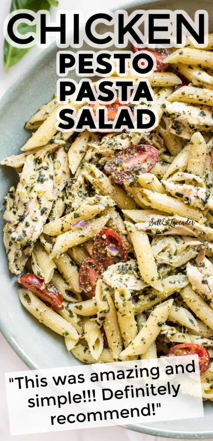 a plate full of pasta with chicken and pesto sauce