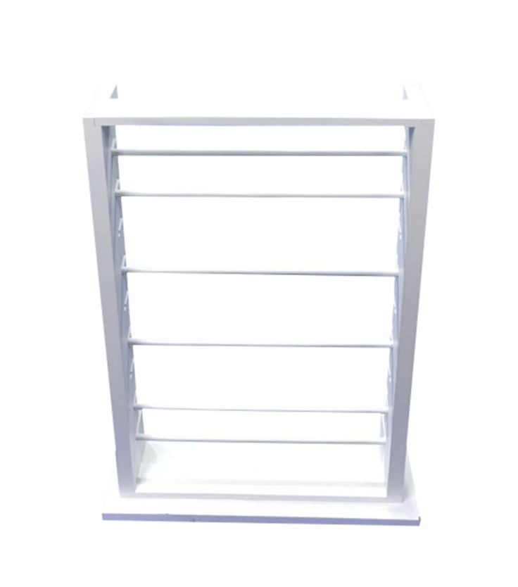 a white shelf with four shelves on each side