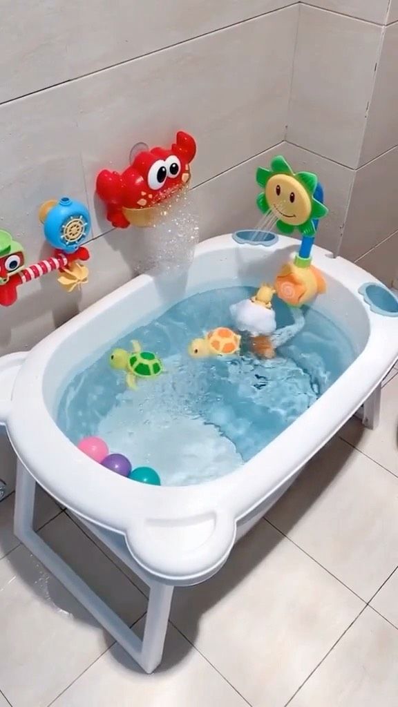 a child's bathtub with toys in it