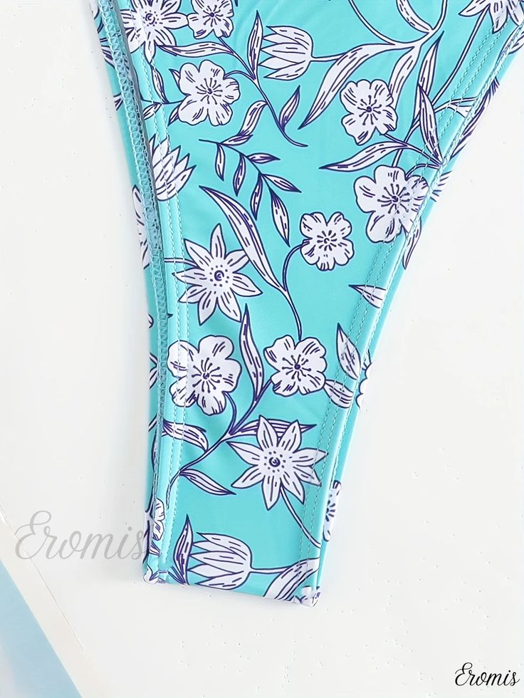 Eromis - Premium Blue Triangle Bikini Set with Floral Print, Frill Detail, and Tie Back - Stylish Swimwear & Clothing for Women Blue Floral Print Tankini For Sunbathing, Light Blue Beachwear Tankini For Swimming, Light Blue Summer Tankini For Swimming, Blue Printed Beach Bottoms, Blue Printed Bottoms For Beach, Printed Blue Bottoms For Beach, Blue Printed Bottoms For Sunbathing, Blue Printed Tie-side Bottoms, Blue Beach Tankini Brief