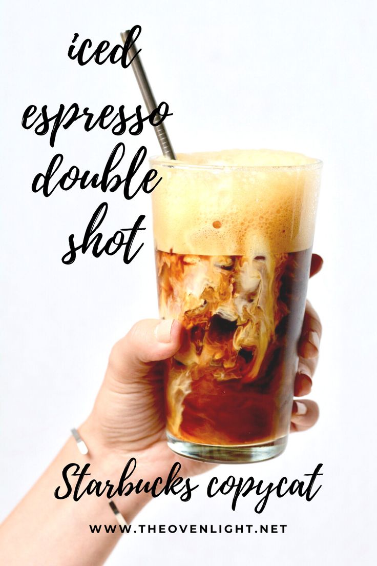 someone holding up a drink with the caption iced espresso double shot starbucks copy