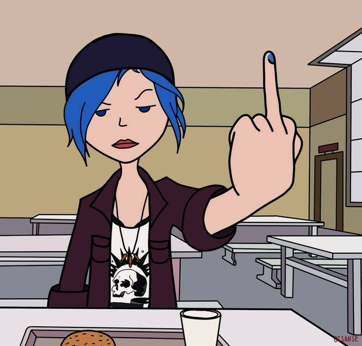 a woman with blue hair is making the peace sign in front of her food tray