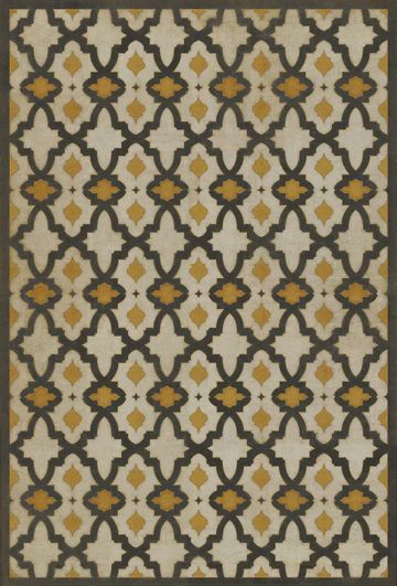 a rug with an intricate design on the front and back sides, in black, beige, and gold colors