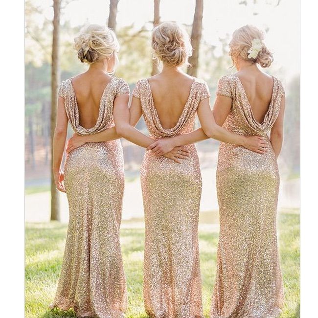 three bridesmaids in gold sequin dresses looking at each other with their back to the camera