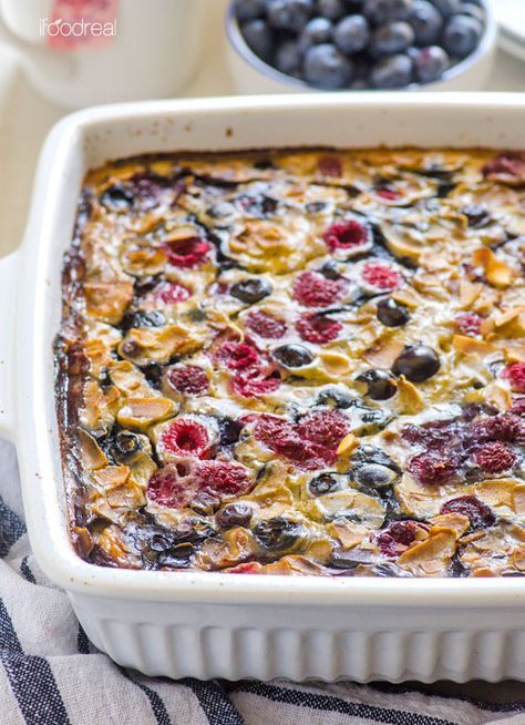 a casserole dish with berries and blueberries in it