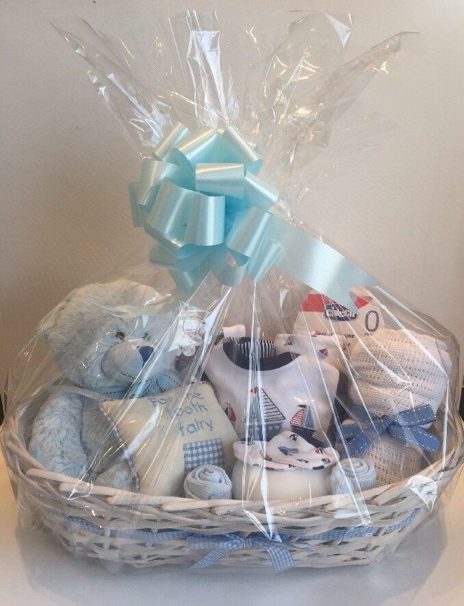 a basket filled with baby items on top of a table