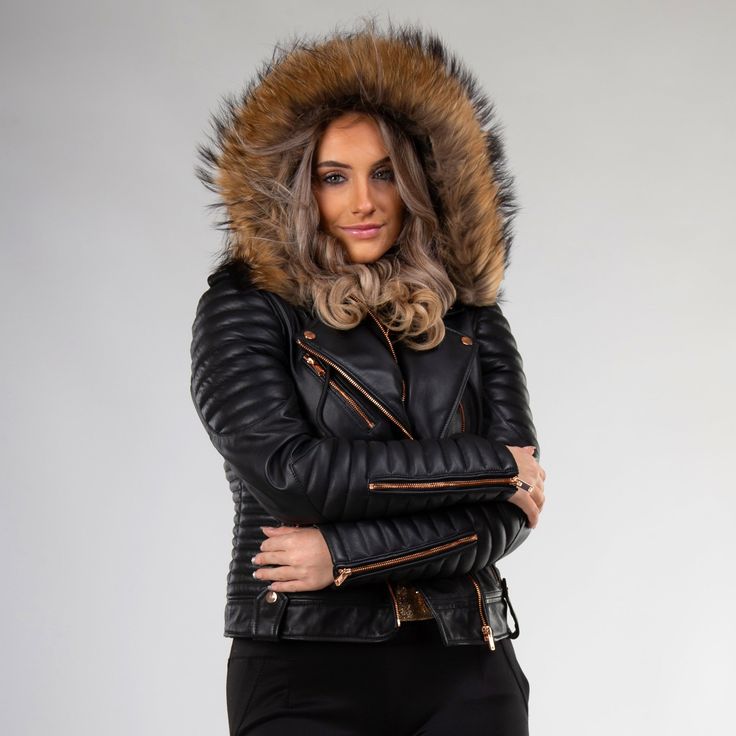 Gasoline | Wind Chill is our most gorgeous line among Moto Style Leather Jackets. The glittering Rose Gold hardwares toned with super fluffy natural raccoon fur presents the ultimate contemporary style every woman desires for. The black Gasoline jacket has been handcrafted with perfection in a classic bikers style from butter-soft sheepskin leather. Removable Hood and Fur - both are detachable and can be taken off when not needed. Wear it with or without Hood or Fur. The silky, luxurious feel of Leather Jacket For Women, Quilted Sleeves, Wind Chill, Leather Jacket With Hood, Leather Industry, Lady Riders, Black Motorcycle, Motorcycle Leather, Moto Style