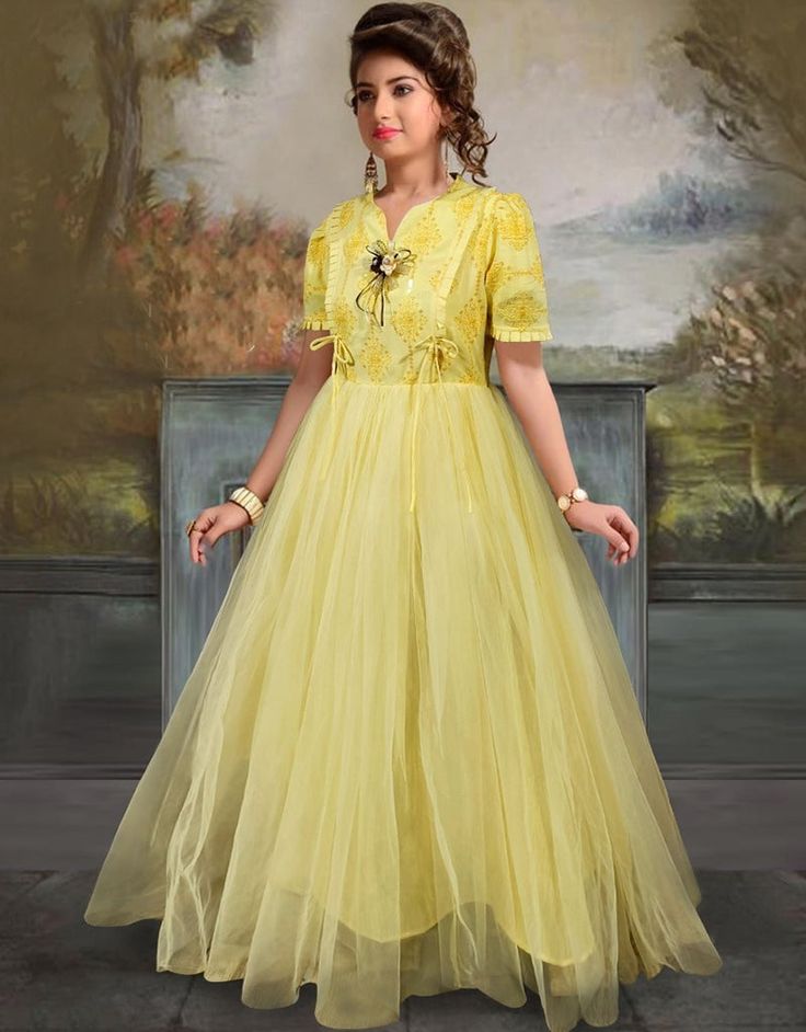 💫 Enhance your evening wardrobe with this versatile and exquisite Yellow Gown Rayon Soft Net! ✨🌟 #Fashionista #ChicStyle #StylishAndConfident #GlamorousGown #ArabicFashion #FashionGoals #ShopNow 👗💃 Yellow Floor-length Wedding Dress, Fitted Ball Gown For Festive Occasions, Fitted Festive Ball Gown Dress, Festive Fitted Ball Gown Dress, Fitted V-neck Gown For Festive Occasions, Festive Fitted V-neck Gown, Fitted Anarkali V-neck Dress, Fitted Anarkali Maxi Dress With V-neck, Yellow Fitted Ball Gown