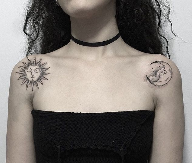 a woman with sun and moon tattoos on her chest