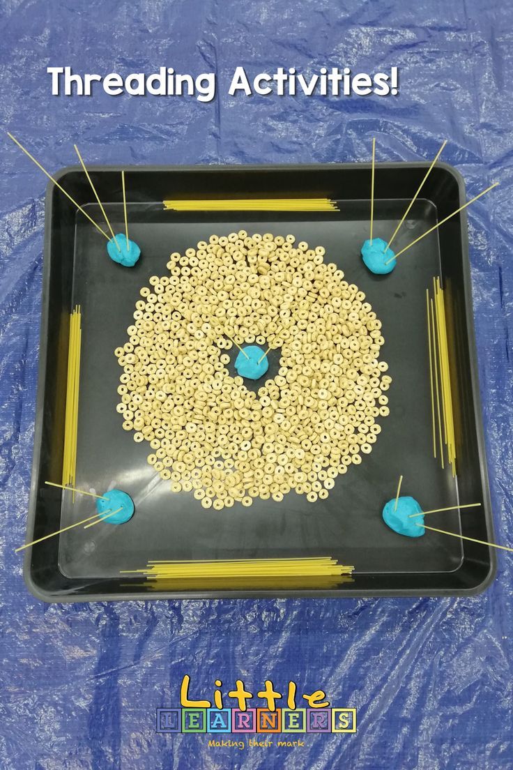 a tray with beads and pins on it that says threading activities for kids to make