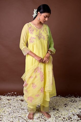 Yellow silk anarkali with placed threadwork blossom motifs on yoke and waistline gathers. Comes with pant, inner and ombre dupatta. - Aza Fashions Spring Floral Embroidered Cotton Silk Anarkali Set, Spring Anarkali Set In Cotton Silk With Traditional Drape, Spring Designer Anarkali Set With Cutdana, Spring Anarkali Cotton Silk Kurta, Anarkali Cotton Silk Kurta For Spring, Spring Anarkali Cotton Silk Set, Spring Anarkali Set In Cotton Silk, Spring Cotton Silk Anarkali Set, Spring Resham Embroidered Traditional Drape Anarkali Set