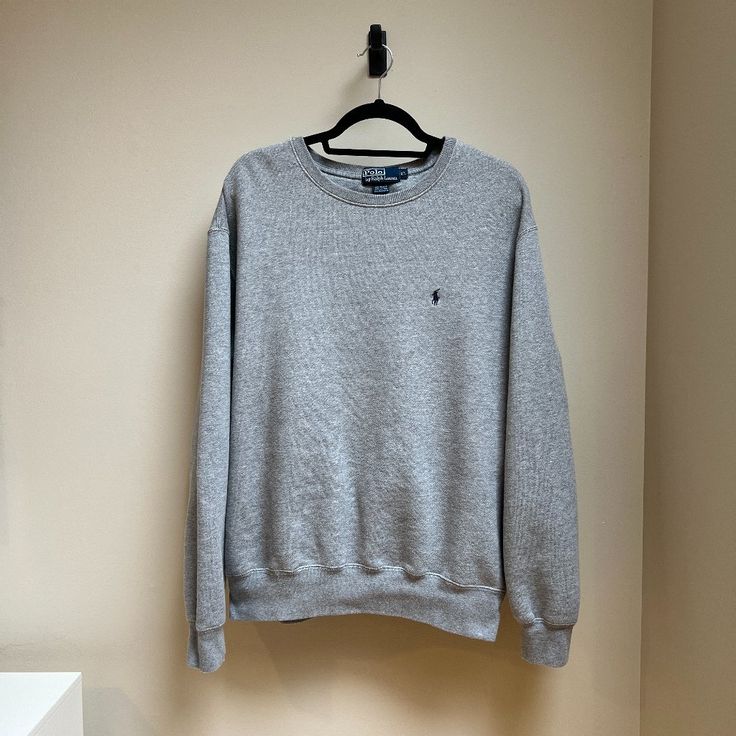 Polo Ralph Lauren Sweatshirt Heather Grey Brand New Without Tags! Not Worn, No Flaws.No Stain, No Rips Perfect New Condition. Heather Grey Size Xl Cross Armpit To Armpit 26 " 27.5 " Length Made From Washed Fleece, Long Sleeves Ribbed Trim Cotton/Polyester Machine Wash Imported Basic Long Sleeve Tops With Ribbed Collar, Casual Crew Neck Top With Ribbed Collar, Casual Tops With Ribbed Crew Neck, Casual Tops With Ribbed Collar For Everyday Wear, Casual Crew Top With Ribbed Collar, Casual Gray Tops With Ribbed Collar, Casual Gray Crew Neck Top, Everyday Long Sleeve Top With Ribbed Collar, Gray Long Sleeve Polo Sweater, Casual