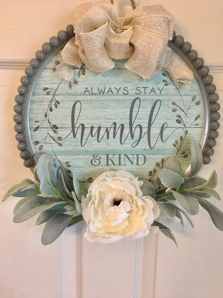 a wooden sign that says, always stay humble and kind with flowers on it