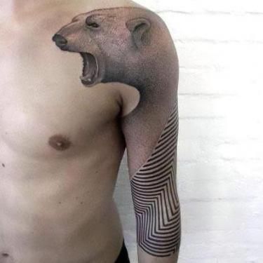 a man with a bear tattoo on his arm