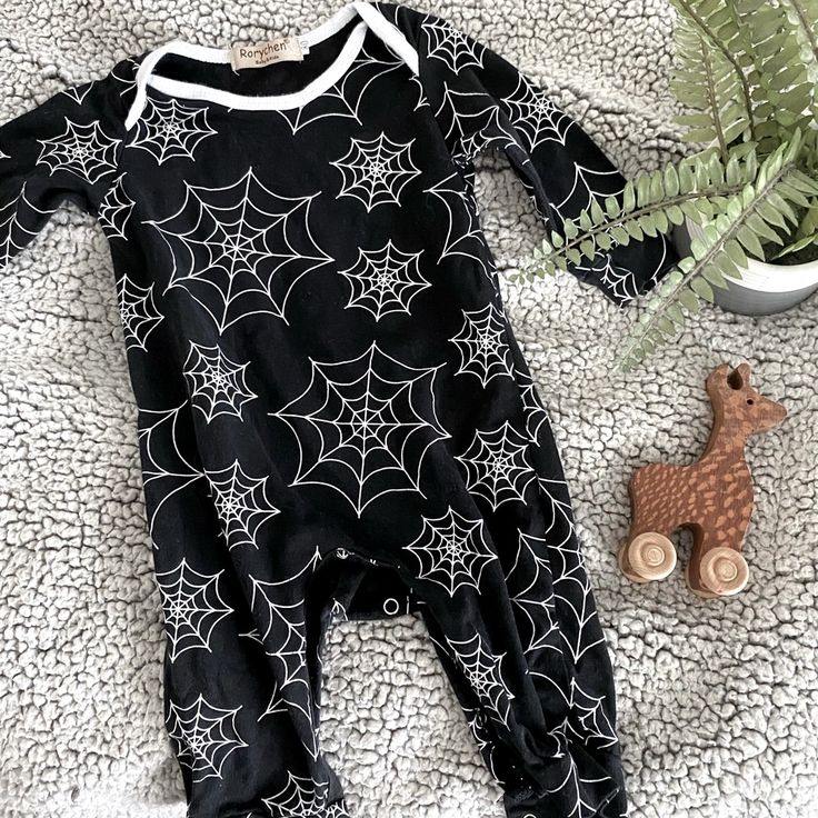 Black Long Sleeve Outfit With Pants. White Trim And White Spider Web Pattern. Tag Says Size 80, Which Is About A Size 9-12 Months. Washed Never Worn. Black Long Sleeve Onesie For Fall, Black Onesie For Halloween Playtime, Grunge Baby Outfits, Gothic Maternity Clothes, Black Cotton Onesie For Playwear, Cute Black Long Sleeve Onesie, Black Halloween Onesie For Playtime, Black Long Sleeve Outfit, Goth Baby Nursery Walmart